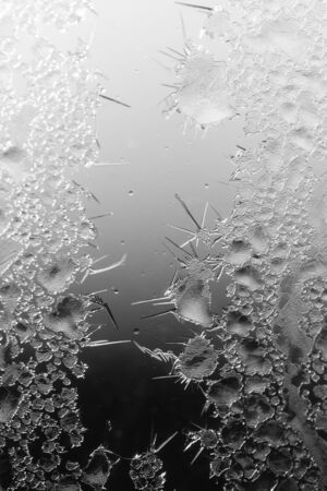 Black and white drawings on the glass in the frost .の写真素材