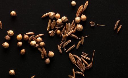 Sesame seeds with bread on a black backgroundの写真素材