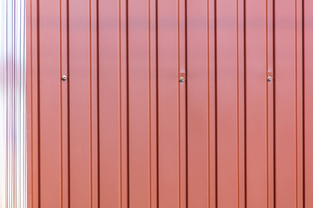 New metal fence made of metal profile as background .