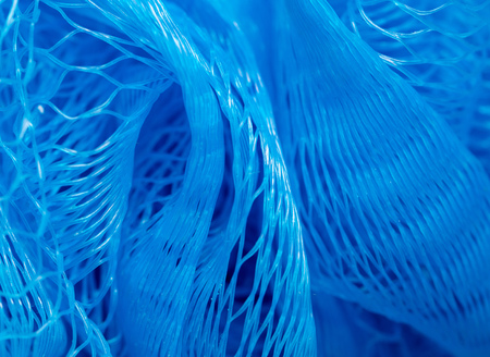 Blue synthetic sponge as an abstract background .の写真素材