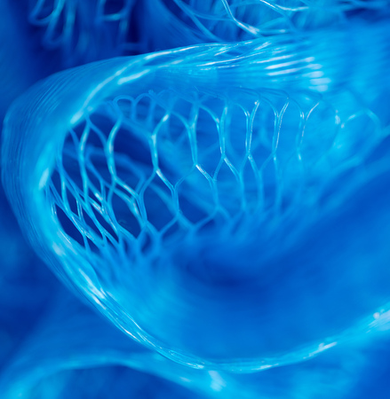 Blue synthetic sponge as an abstract background .の写真素材