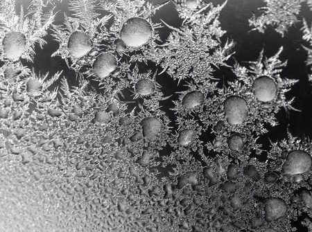 Black and white drawings on the glass in the frost .の写真素材