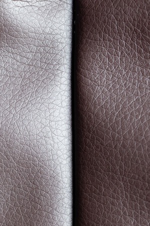 Brown leather material as an abstract background .