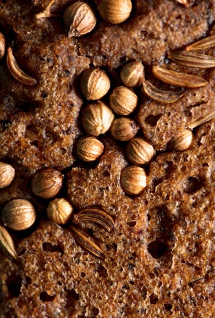 sesame seeds on black bread as a background, macroの写真素材
