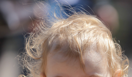 Hair blond on the head of a little boy .の写真素材