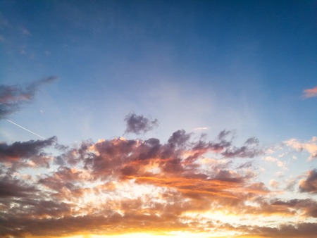 Beautiful clouds at sunset as an abstract background .