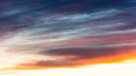 Beautiful clouds at sunset as an abstract background .