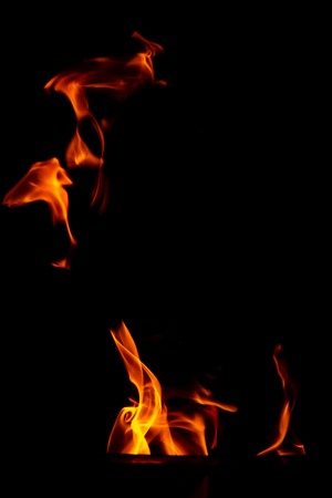 Red flame of fire on a black background .の写真素材