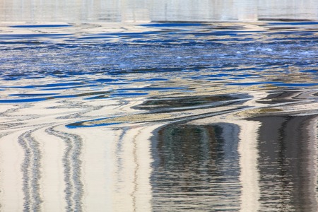 Reflection of a building on the surface of water .の写真素材
