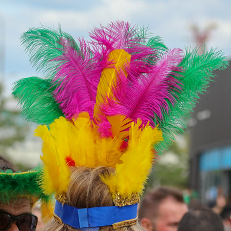 Colored feathers on the head of a girl .の写真素材