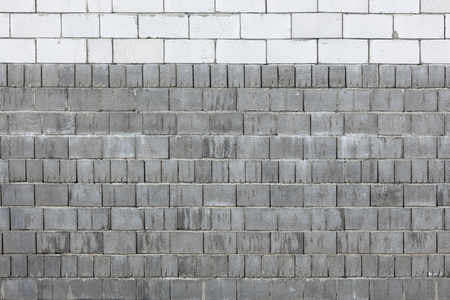Brick wall in a house under construction as an abstract background