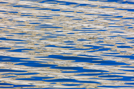 Reflection of a building on the surface of water .の写真素材