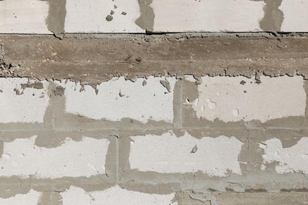 Bricks made of concrete blocks as a background .
