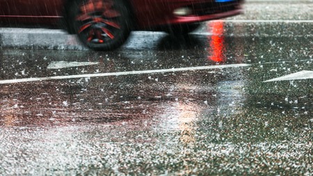 Rain on the asphalt road as background .の写真素材