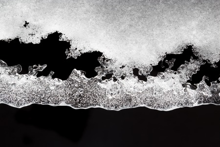 Ice in the snow in winter as a background .