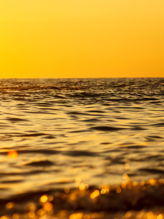 Rays of sunset on the black sea .の写真素材