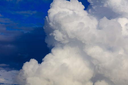 White creamy clouds in the sky as a background .の写真素材
