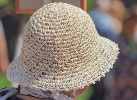 Knitted cap on the head of a woman .の写真素材