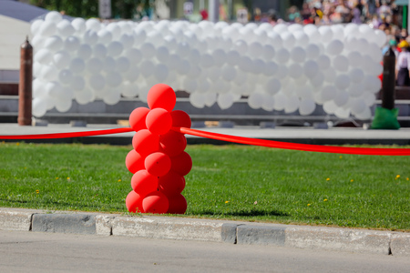 Red balls on a holiday in the park .の写真素材