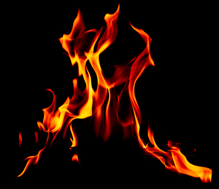 Flame of fire on a black background .
