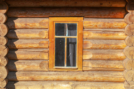 Window in the house with a log house .の写真素材