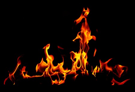 Flame of fire on a black background .