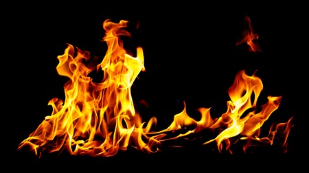Flame of fire on a black background .