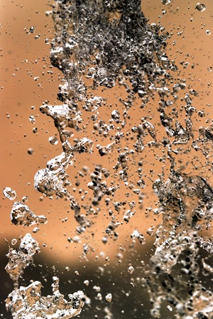 Water splashing in inversion as an abstract background .