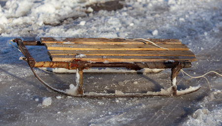 Old sled in the snow in winter .の写真素材