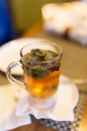 A glass of mint tea in a restaurant .の写真素材