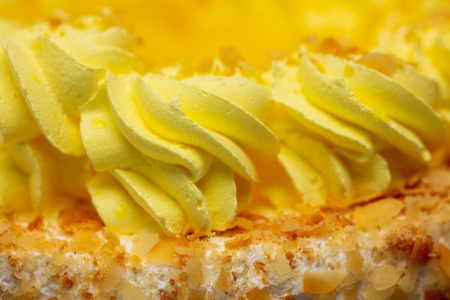 Cake with yellow cream and pineapple. Macroの写真素材