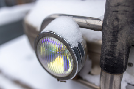 Frozen snow with ice on a car in winter .の写真素材