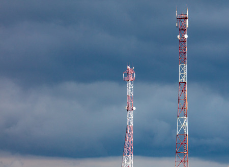 Metal tower for the transfer of tv on the background of clouds .の写真素材