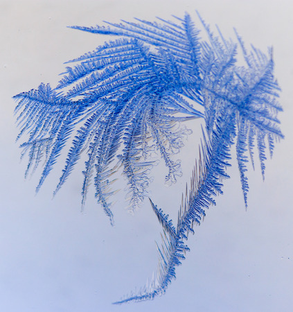 Snow patterns on glass as an abstract background .の写真素材