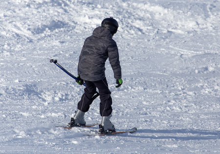 Man skiing in the snow in winter .の写真素材