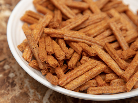 Rusks in a plate on the table .