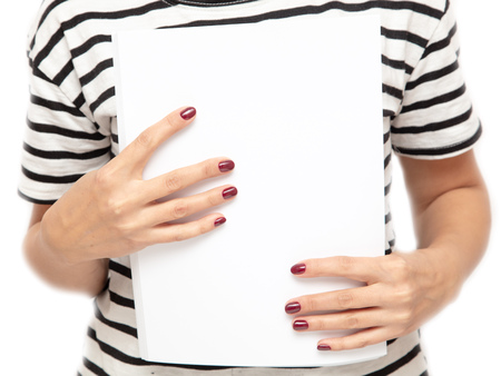 Girl with office paper in hands on white background .の写真素材