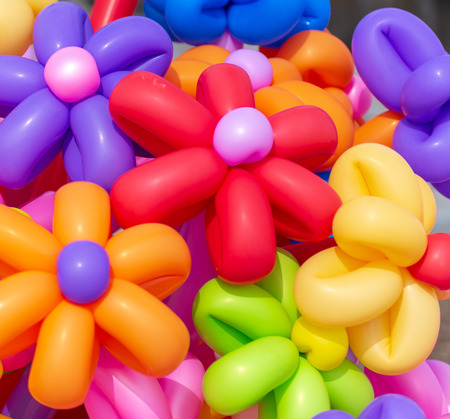 Multicolored flowers from balloons as background .の写真素材