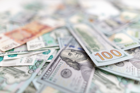 Dollars and Russian rubles on the table as background .の写真素材