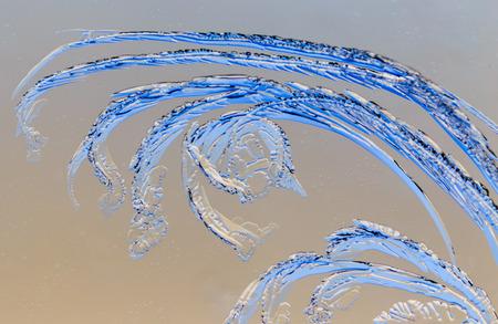 Snow patterns on glass as an abstract background .の写真素材