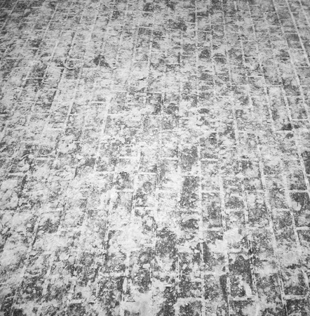 Footprints in the snow as an abstract background.の写真素材