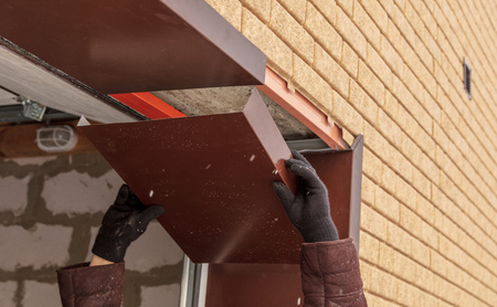 Worker metal door in the house .