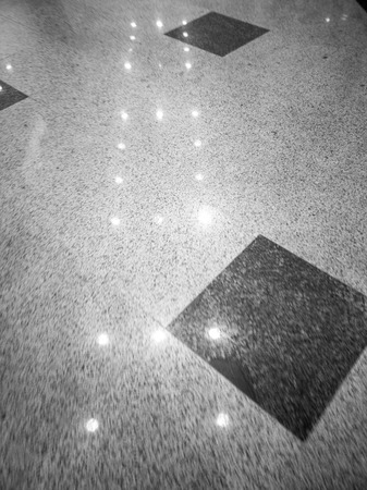 Reflection of light on a tiled floor as a background.の写真素材