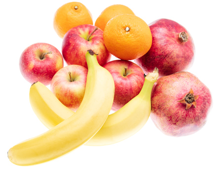Ripe bananas and apple other fruits on white background .の写真素材