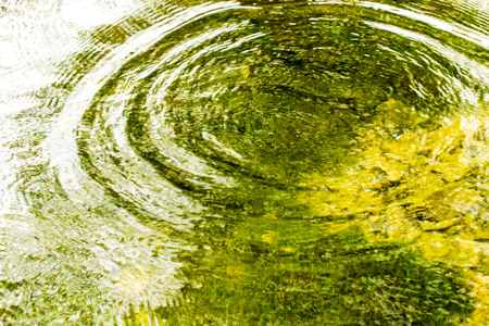 Circles on the surface of the reservoir as a background .の写真素材