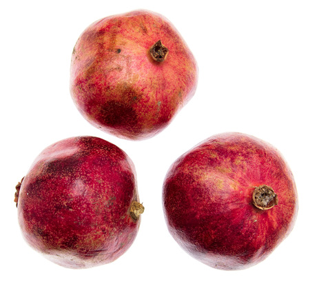 Ripe red pomegranates isolated on white background .の写真素材