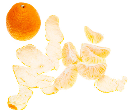 Open and whole tangerines on a white background .の写真素材