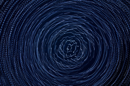 Blue lights in motion at night as an abstract background.