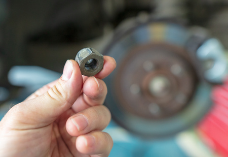 Bolts from the car in the workshop .の写真素材