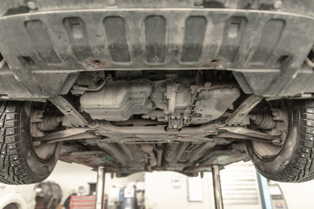 Jacked up cars in the workshop .の写真素材